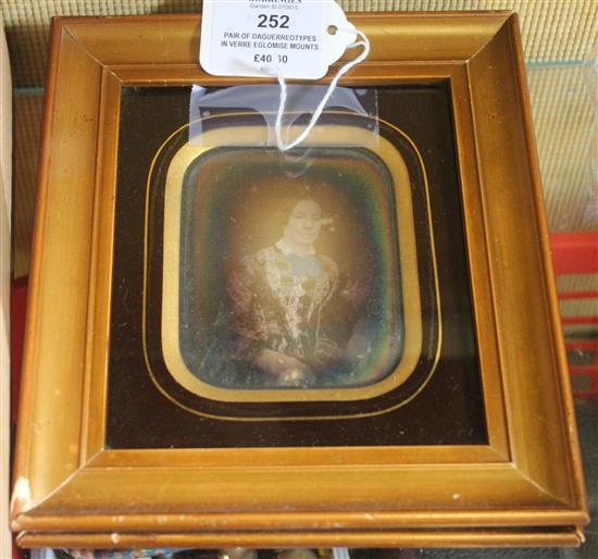 Pair of daguerreotypes in verre eglomise mounts